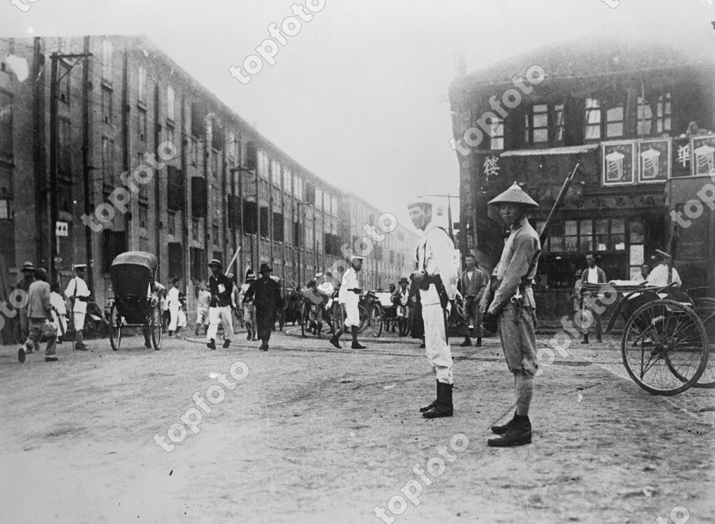 Plenty police in Shanghai . This typical scene in Shanghai shows the ...