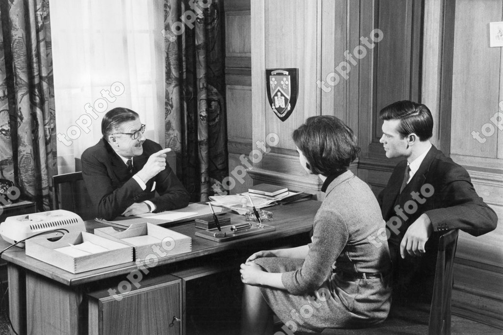 couple-asking-the-bank-manager-for-a-home-loan-in-the1960-s-topfoto