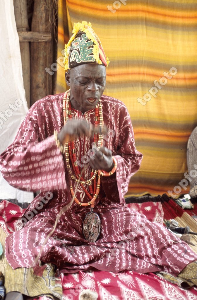 BEN, Benin, Ketu district: The sorcerer working a powerful fetish to give  his curse more power. - TopFoto