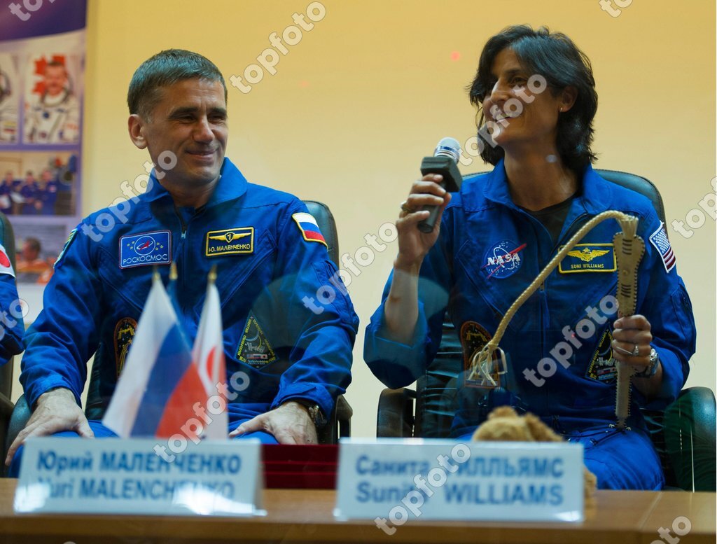 Quarantined Expedition 32 Nasa Flight Engineer Sunita Williams Is Presented With A Traditional